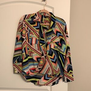 Here is a women’s multi colored small blouse